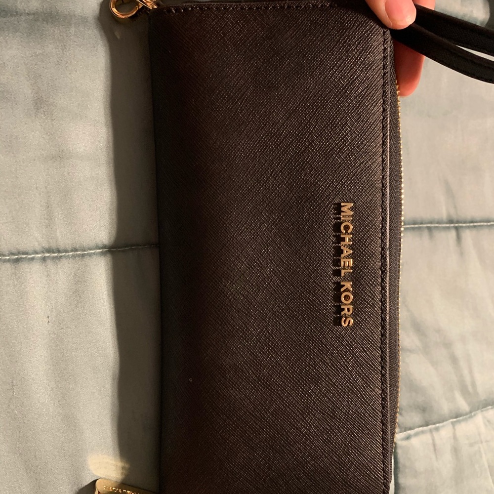 Black Micheal kors wallet.  Brand new.  Never used